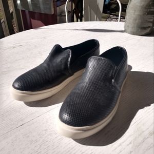 Black leather Steve Madden slip ons